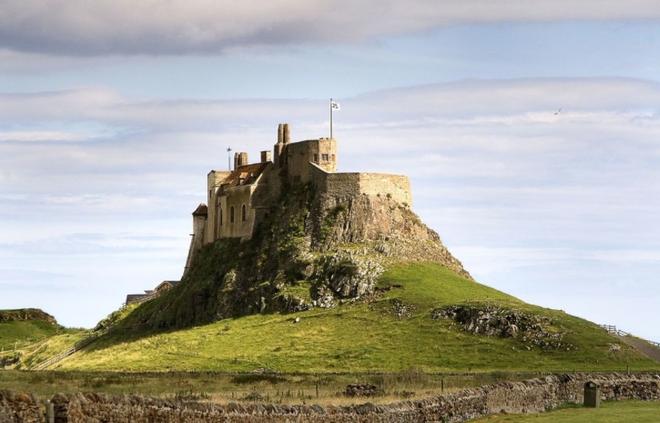 This photo of Lindisfarne Castle from Wikipedia without all the scaffolding © SV Taipan
